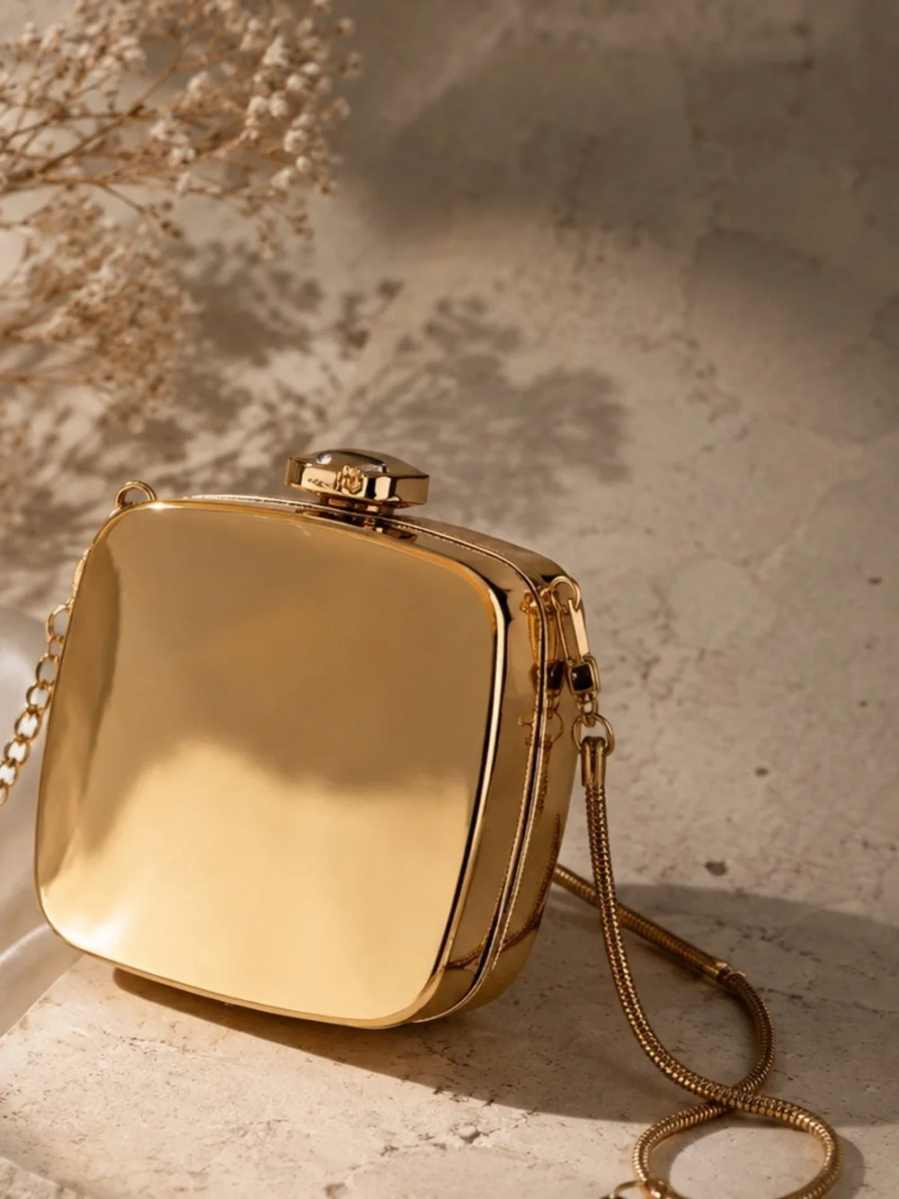 Luxe Gold Box Clutch with Sculptural Metallic Finish Elegant Evening Handbag